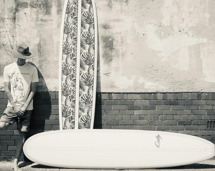 Colby longboards outside the Durban shaping bay